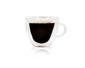 Transparent double wall glass mug with espresso coffee isolated on white background.Hot coffee in a glass with double walls isolated on a white background. 