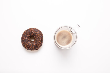 Chocolate donut on a white background close-up.