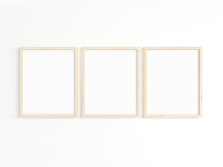 Three thin 8x10 wooden frames with portrait orientation. 3D illustration.
