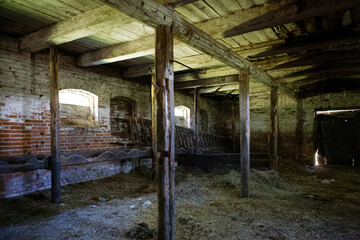 interior of an old stable horse stall