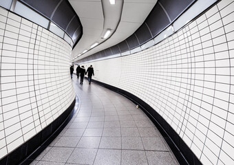 white tunnel in the subway station