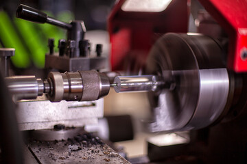 Drill holes with a drill on a lathe.