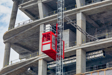 Construction hoists for workers and material