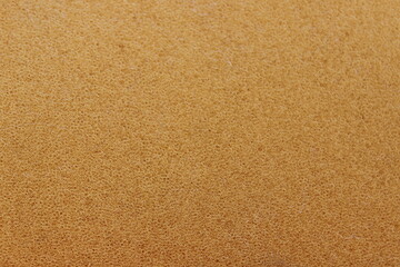 Texture of old yellow foam rubber. Macro. Russia.



