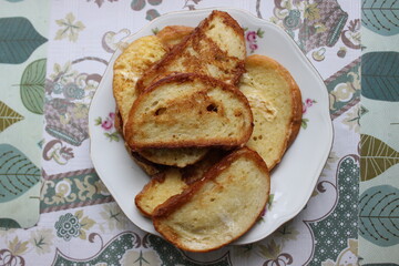 Fried white bread with egg. Russia.