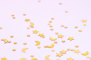 Christmas modern composition. Golden decorations, confetti on white background. copy space