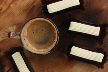 Americano coffee with chocolate brownies on the table