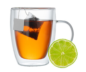 Glass cup of black tea with bergamot isolated on white