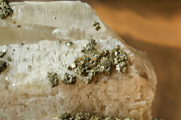 Natural solid and glossy and beautiful geometric Pyrith on Quartz crystals stucture. Texture of gemstone