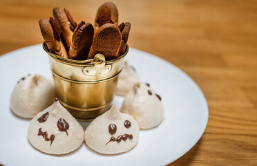 Scary finger-shaped almond shortbread cookies and Ghost style meringue.