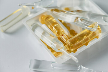 Medicines on a white background. Coronavirus treatment and protection. Vaccine, antibiotics,...