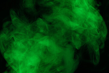 Green steam on a black background.