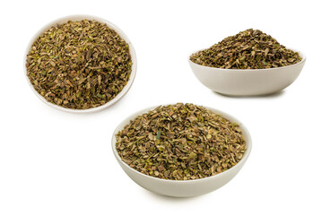 Oregano in a bowl isolated.