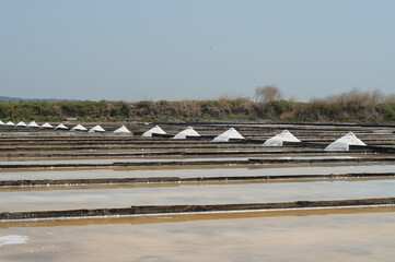 Naklejka premium salt flats with piles of salt built up