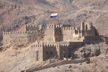 flag of EGYPT on the wall of an ancient fortress