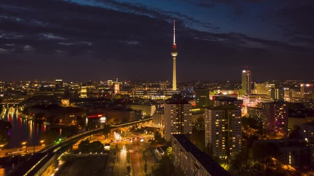 Berlin at Night Aerial Hyperlapse, Motion Time Lapse of Alexanderplatz TV Tower Establishing Shot and beautiful city lights, Hyper Lapse
