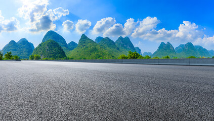 Empty asphalt highway and green mountain natural scenery in Guilin,China.