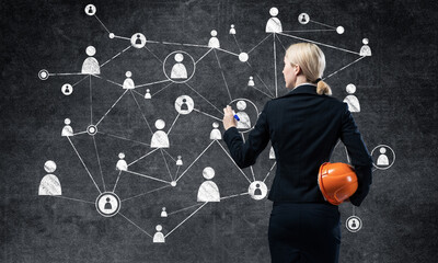 Businesswoman pointing on abstract 3d network
