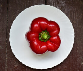 Red pepper on a white plate