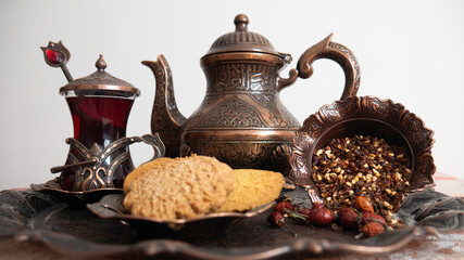 Oriental set for tea with biscuits.