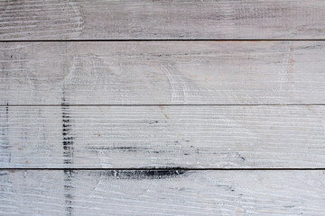 Vintage white wood background texture with knots and nail holes. Old painted wood wall. White abstract background. Vintage wooden dark horizontal boards