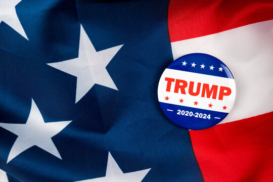 trump 2020-2024 text on american election vote button on united states national flag. 2020 presidential election concept.