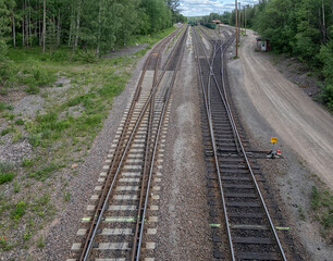 Obraz premium railroad point: to one railway line is moving to two tracks