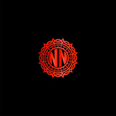 Initials logo NN mandala combination on a black background