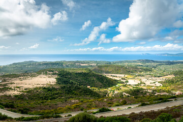 Obraz premium Clouds over Sardinia coastline in fall