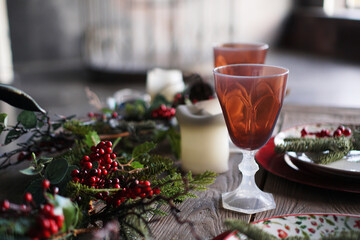 Christmas and New Year dinner decor on blurred background with light from window