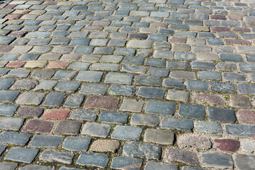 Colored Cobblestone pavement in summer