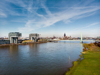 Naklejka premium Drone view on the modern architecture of Cologne with Cathedral in background.