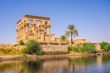The beautiful temple of Philae and the Greco-Roman buildings seen from the Nile river, a temple...
