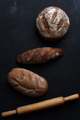 Flat lay bread background. Freshly baked assortment of bread.