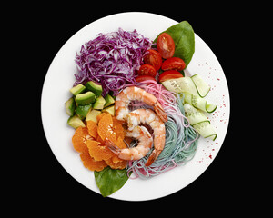 multicolored rainbow Asian noodles with shrimp and vegetables salad. High quality photo