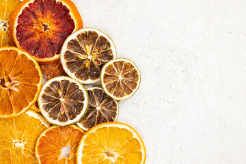 Dried citrus fruits composition with orange and lime. Creative Сhristmas concept.