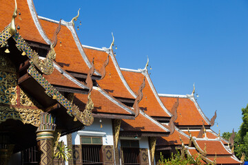 Thailand Wat Ket Karem roofs, red with dragon motifs