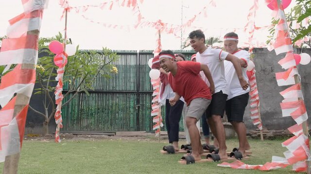 participants were happy at traditional bakiak race in celebration of Indonesia's independence anniversary