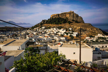 The modern village of Lindos is located on the coast of the island of Rhodes on the site of the...