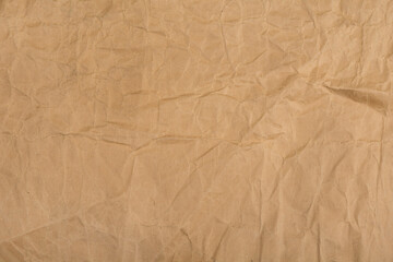 Fototapeta premium Brown crumpled paper with stains for background