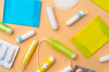 Flat lay of Pads, tampons and pills