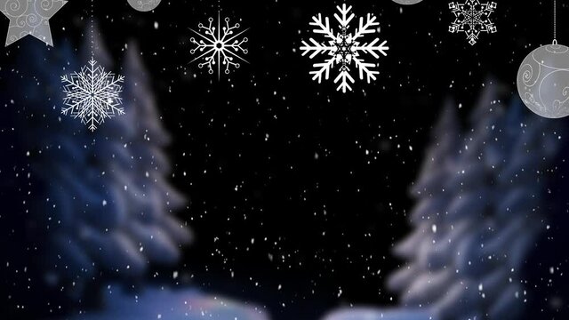 Digital animation of snow falling over christmas star and bauble decorations