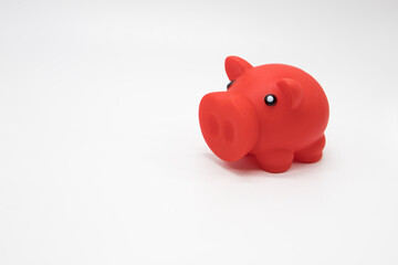 Saving money for a rainy day. Piggy banks on a white background