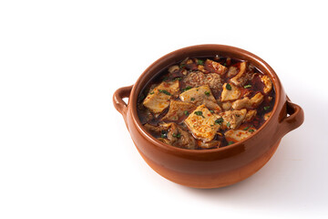 Traditional mondongo or el menudo soup isolated on white background.Copy space