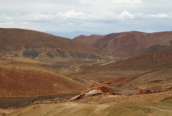 Desert landscape. View of the road across the arid mountains. 
