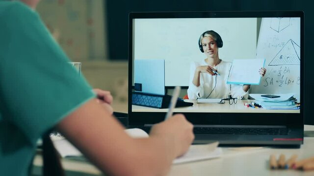 Online lesson held by a female teacher for a teenage girl