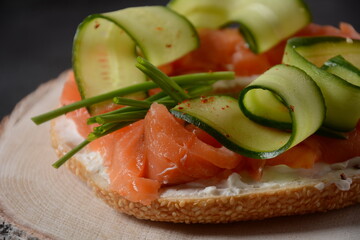Bagel sandwich with salmon, cream cheese, cucumber, 