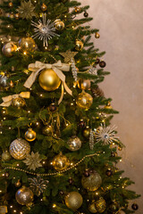 Decorated Christmas tree in brown and gold tones. Vertical frames
