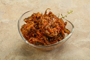 Canned anchovy in tomato sauce