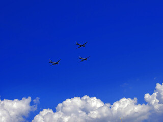 Fototapeta na wymiar Russian military aircraft on a blue sky background